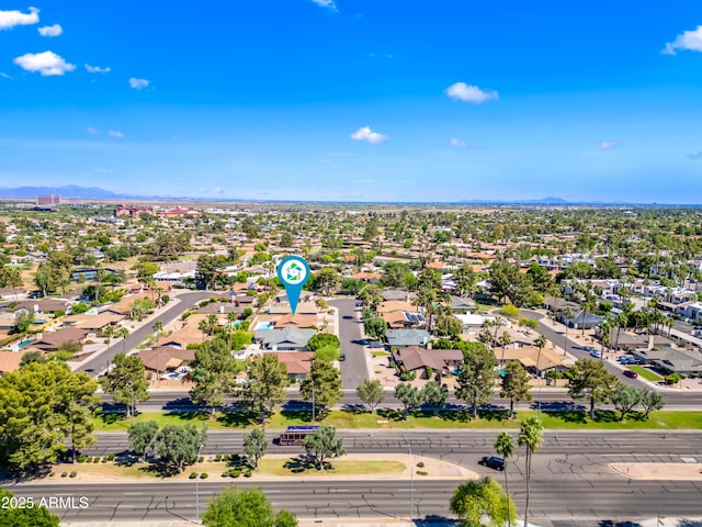 aerial perspective of suburban area featuring a mountain backdrop
