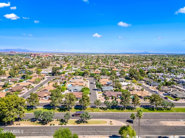 aerial view of residential area with mountains