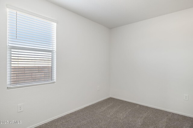 25235 N 183rd Dr, Wittmann, AZ 85361 - carpeted spare room with baseboards