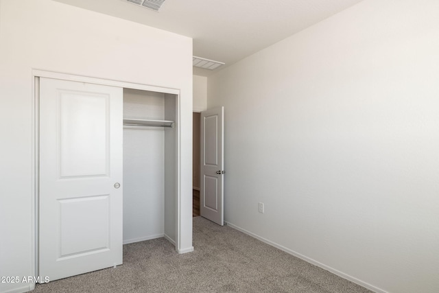 25235 N 183rd Dr, Wittmann, AZ 85361 - unfurnished bedroom with carpet flooring, a closet, and baseboards