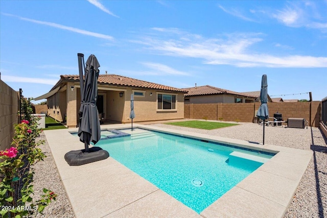 view of pool with a patio area