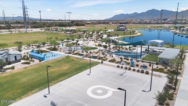 bird's eye view featuring a water and mountain view