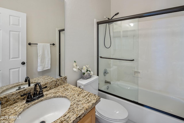 7758 E Nestling Way, Scottsdale, AZ 85255 - bathroom with combined bath / shower with glass door, vanity, and toilet
