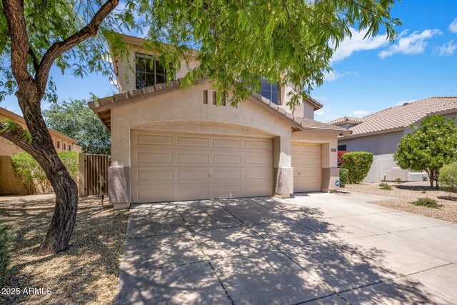 7758 E Nestling Way, Scottsdale, AZ 85255 - view of front of house with stucco siding, driveway, a tile roof, and fence