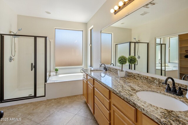 7758 E Nestling Way, Scottsdale, AZ 85255 - full bathroom with a stall shower, a garden tub, double vanity, and tile patterned floors