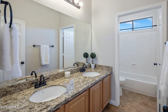 7758 E Nestling Way, Scottsdale, AZ 85255 - full bathroom with toilet, double vanity, tile patterned flooring, and shower / washtub combination