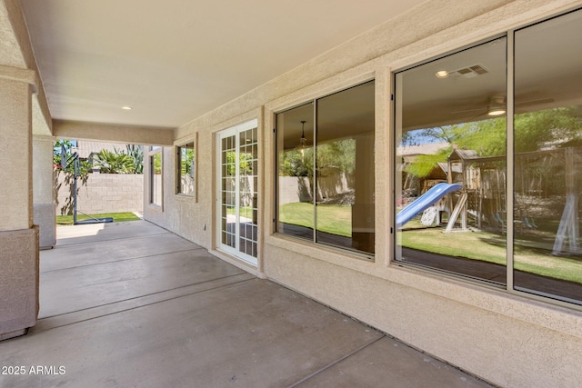 7758 E Nestling Way, Scottsdale, AZ 85255 - view of patio / terrace with fence and a playground