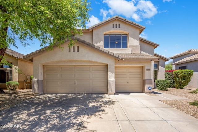 7758 E Nestling Way, Scottsdale, AZ 85255 - view of front of home featuring stucco siding, a tile roof, and driveway