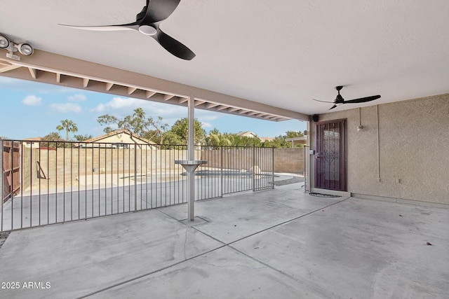 view of patio / terrace featuring ceiling fan