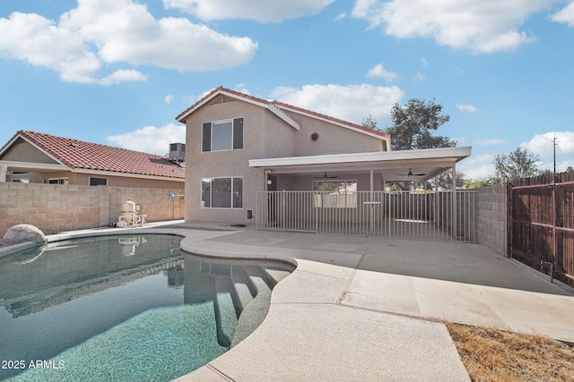 view of pool with a patio, central AC unit, and ceiling fan