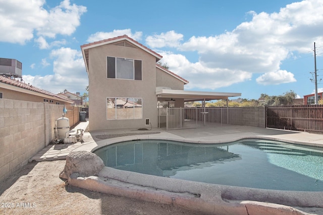 view of swimming pool with a patio