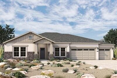 craftsman-style house featuring an attached garage, board and batten siding, and driveway