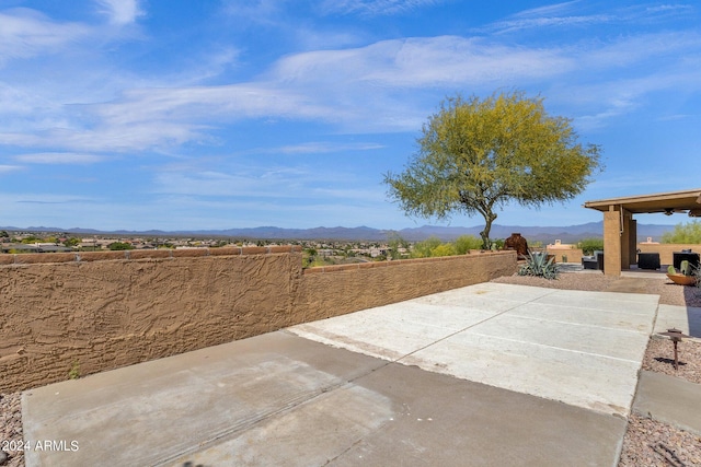 view of patio featuring a mountain view