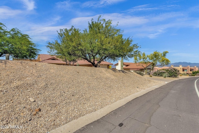 view of front of home featuring a residential view and a flat roof