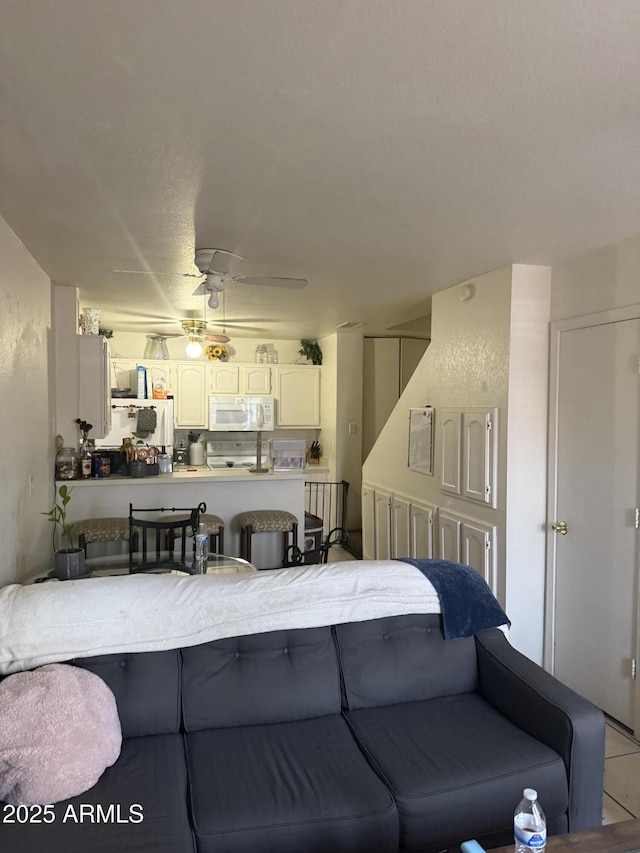 2301 E University Dr Unit 280, Mesa, AZ 85213 - living room with a ceiling fan