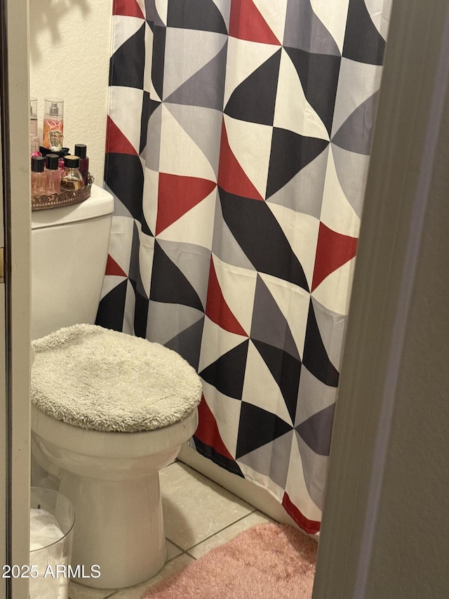2301 E University Dr Unit 280, Mesa, AZ 85213 - bathroom with toilet, a shower with shower curtain, and tile patterned flooring