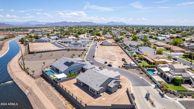 bird's eye view with a residential view and a mountain view