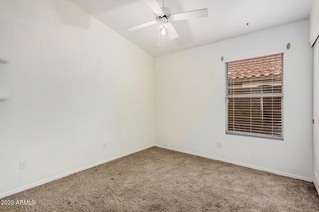 unfurnished room with a ceiling fan, baseboards, and carpet floors