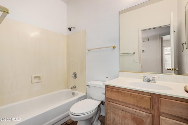 bathroom featuring toilet, vanity, and washtub / shower combination