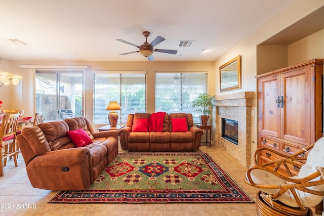 tiled living room featuring ceiling fan