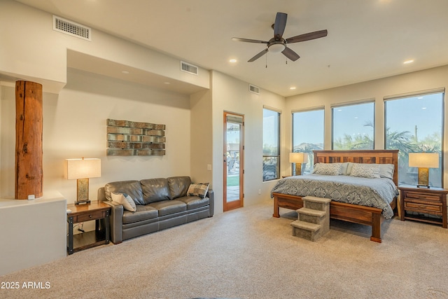 carpeted bedroom featuring access to outside and ceiling fan