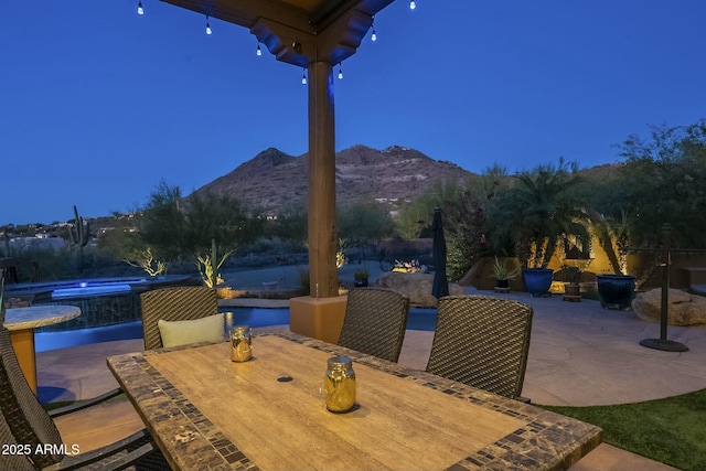 view of patio with a mountain view