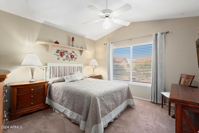 bedroom featuring ceiling fan, light carpet, and lofted ceiling