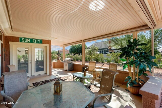 view of patio featuring french doors