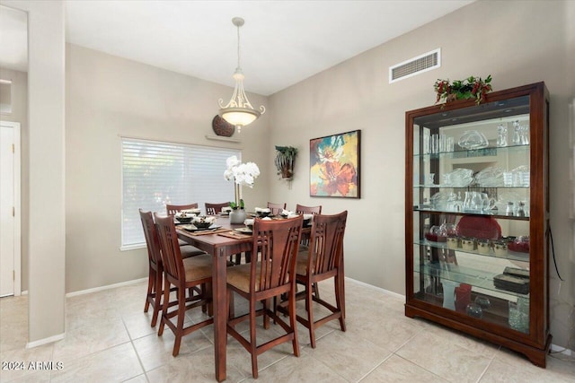 dining room with light tile patterned floors