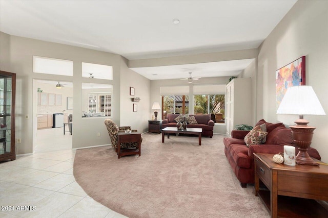 tiled living room featuring ceiling fan