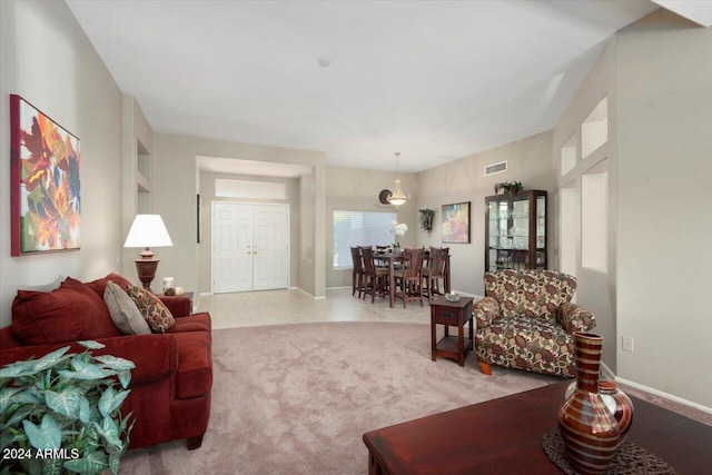 living room with light tile patterned flooring