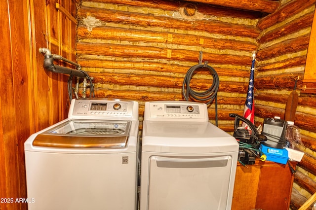 669 W Monarch Cir, Lakeside, AZ 85929 - laundry room with washing machine and clothes dryer and log walls