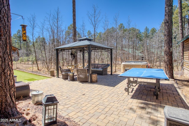 669 W Monarch Cir, Lakeside, AZ 85929 - view of patio / terrace with a gazebo, an outdoor living space, and a hot tub