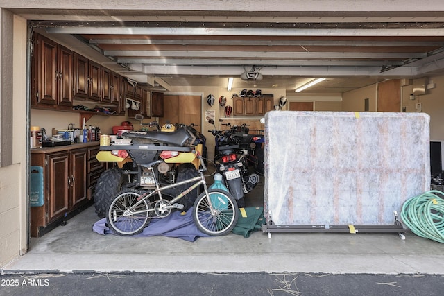 garage featuring a garage door opener