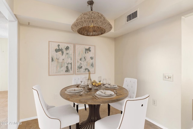 view of tiled dining space