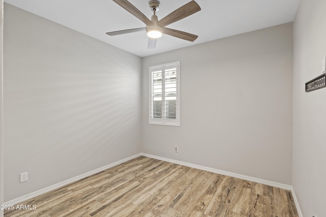 unfurnished room featuring ceiling fan and light hardwood / wood-style floors