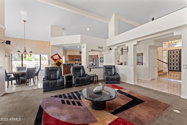 29806 N 43rd Pl, Cave Creek, AZ 85331 - carpeted living area featuring visible vents, baseboards, a chandelier, stairs, and high vaulted ceiling