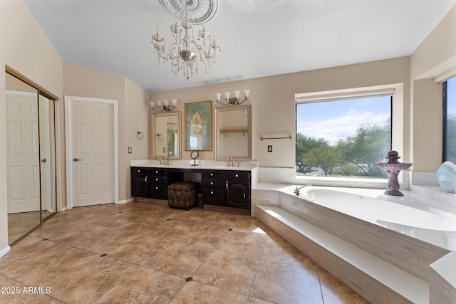 29806 N 43rd Pl, Cave Creek, AZ 85331 - full bath featuring a sink, double vanity, an inviting chandelier, and a garden tub