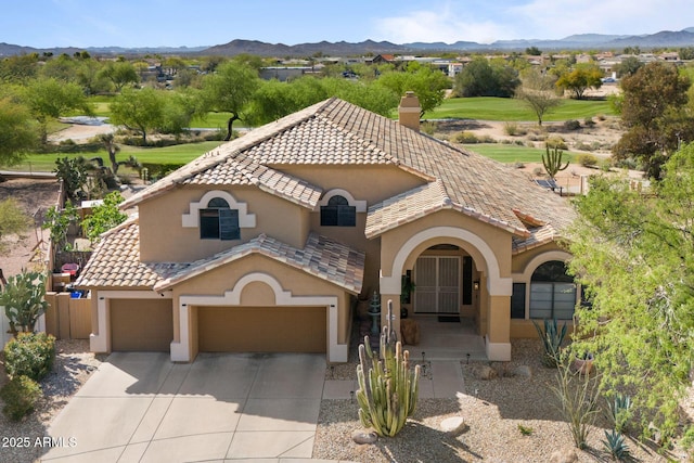 29806 N 43rd Pl, Cave Creek, AZ 85331 - mediterranean / spanish-style house featuring a mountain view, stucco siding, concrete driveway, and a tile roof
