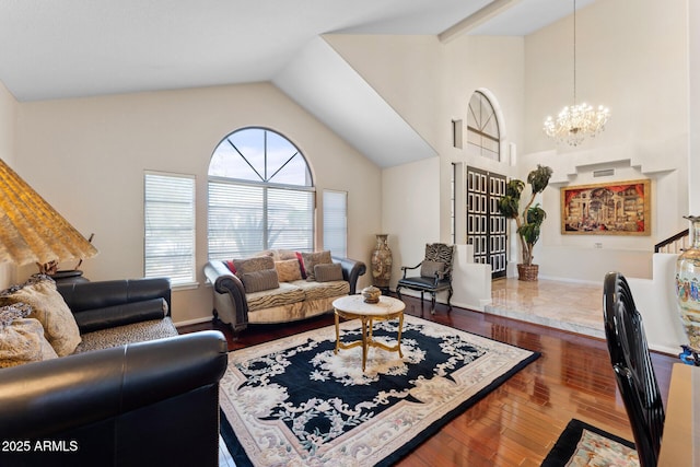 29806 N 43rd Pl, Cave Creek, AZ 85331 - living area featuring hardwood / wood-style floors, high vaulted ceiling, a notable chandelier, and baseboards