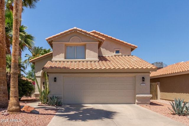 3222 E Cortez St, Phoenix, AZ 85028 - mediterranean / spanish home with driveway, stucco siding, a garage, and a tile roof