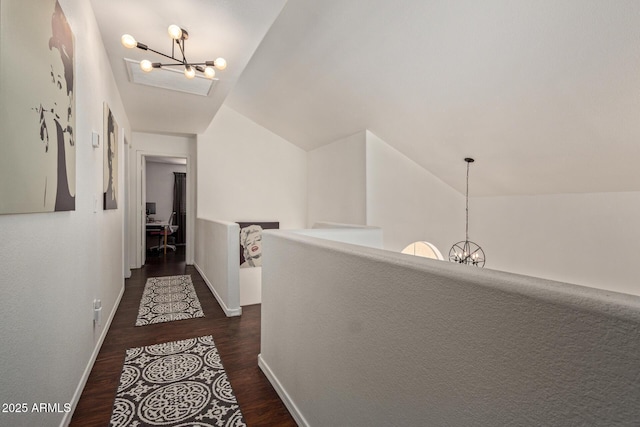 3222 E Cortez St, Phoenix, AZ 85028 - corridor with a chandelier, wood finished floors, vaulted ceiling, and baseboards