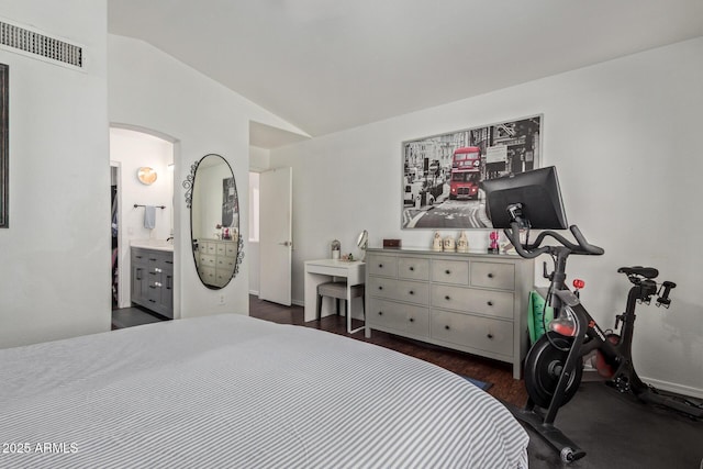 3222 E Cortez St, Phoenix, AZ 85028 - bedroom with vaulted ceiling, arched walkways, dark wood-type flooring, and ensuite bath