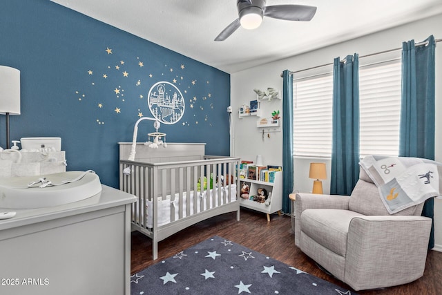 3222 E Cortez St, Phoenix, AZ 85028 - bedroom with a nursery area, wood finished floors, and a ceiling fan