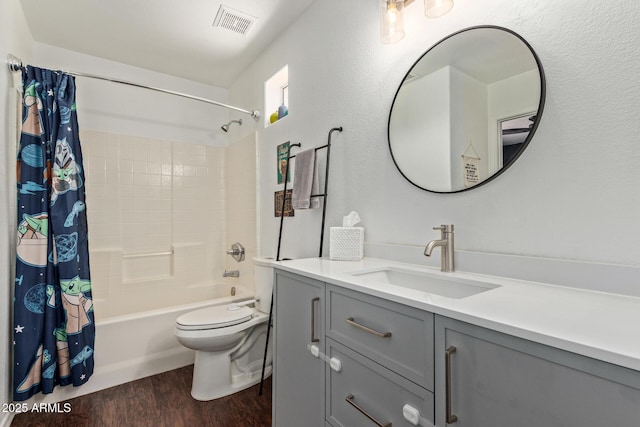3222 E Cortez St, Phoenix, AZ 85028 - bathroom with wood finished floors, toilet, vanity, and shower / bath combination with curtain