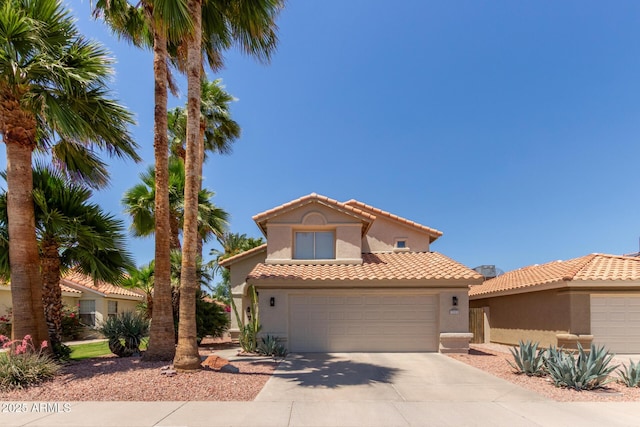 3222 E Cortez St, Phoenix, AZ 85028 - mediterranean / spanish home with stucco siding, a garage, driveway, and a tile roof