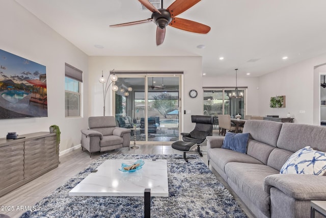 4876 N 207th Ln, Buckeye, AZ 85396 - living area featuring visible vents, baseboards, a ceiling fan, and recessed lighting