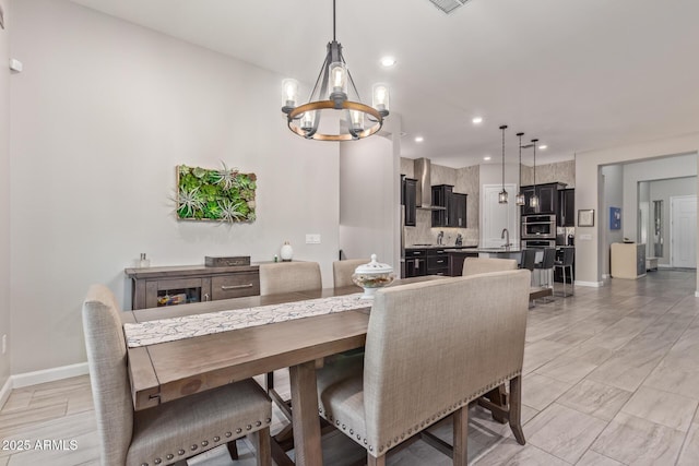 4876 N 207th Ln, Buckeye, AZ 85396 - dining room featuring visible vents, baseboards, recessed lighting, and a notable chandelier
