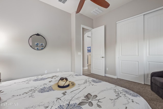 4876 N 207th Ln, Buckeye, AZ 85396 - carpeted bedroom featuring visible vents, a closet, baseboards, and ceiling fan
