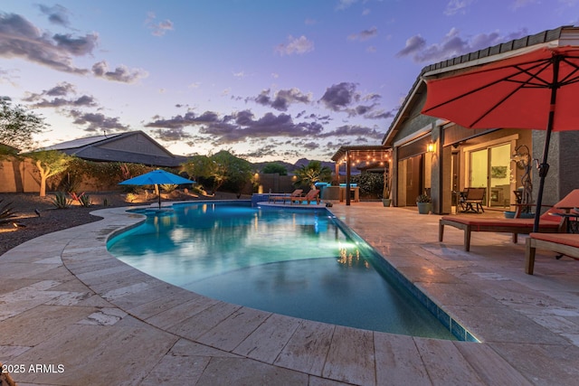 4876 N 207th Ln, Buckeye, AZ 85396 - pool featuring a patio area and a fenced backyard